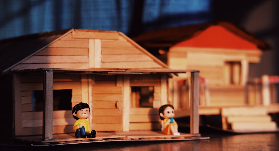 children playing dollhouse family figures