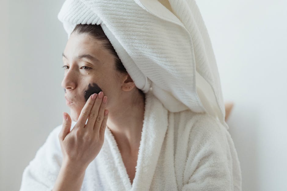 woman applying cooling face mask skincare